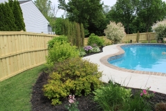 Wood privacy fence installed for pool security