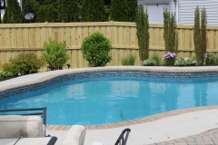 Pool privacy fence installed by Excel Fencing and Decking
