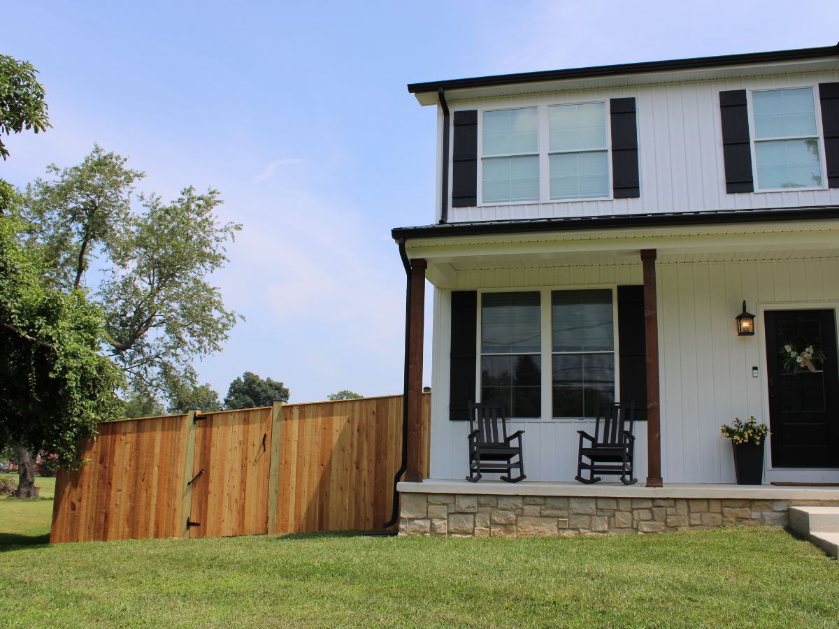 Cedar fence installed on white house