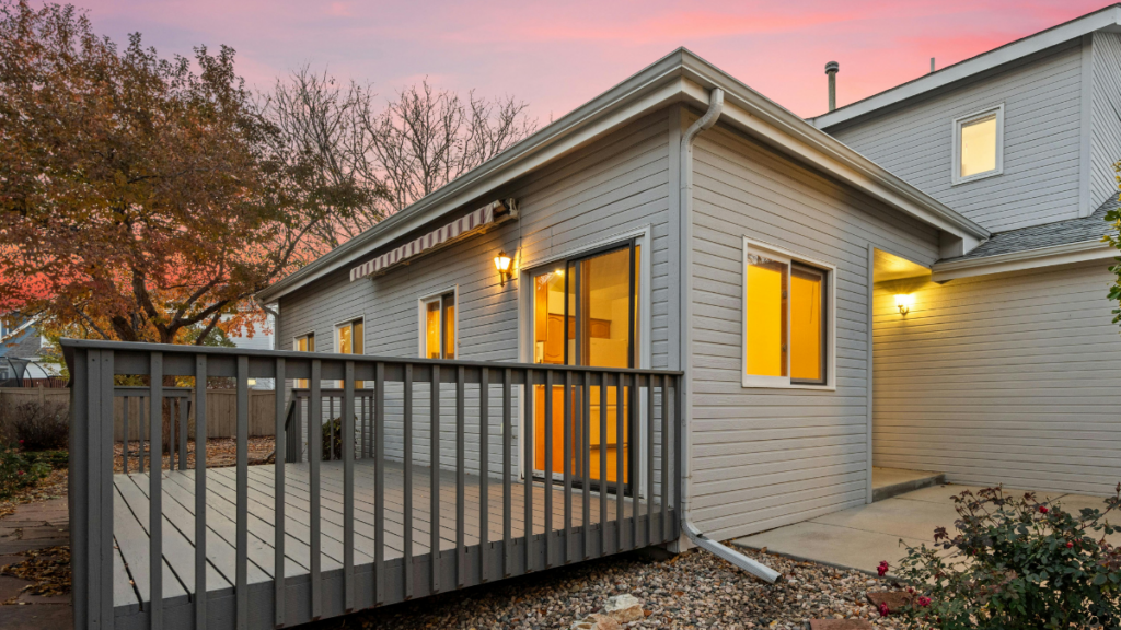 Backyard deck at sunset showcasing professional deck