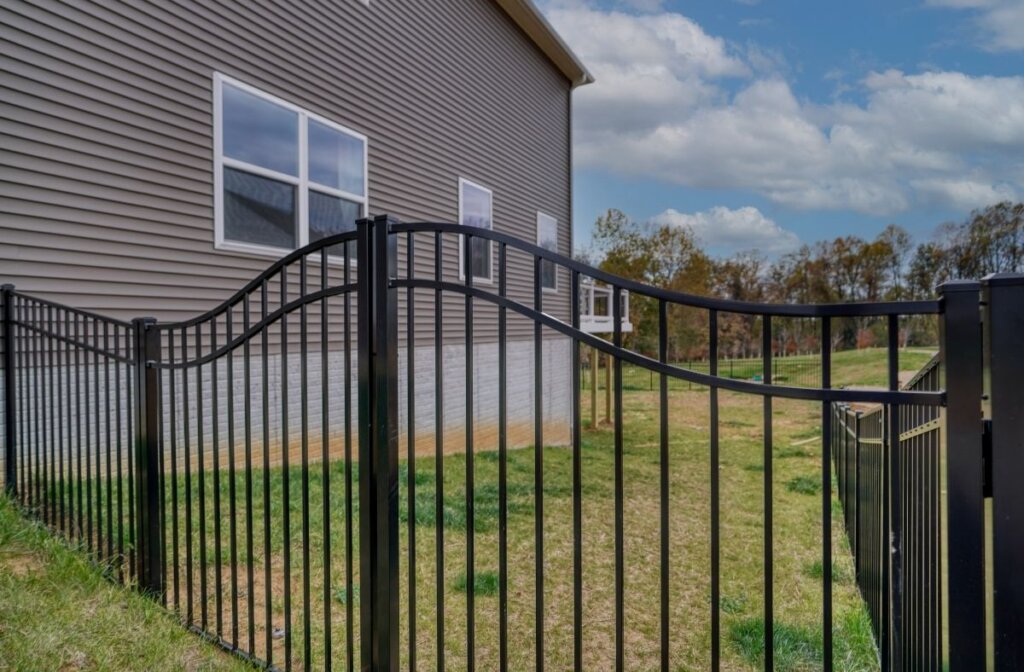 Arched black gate entrance