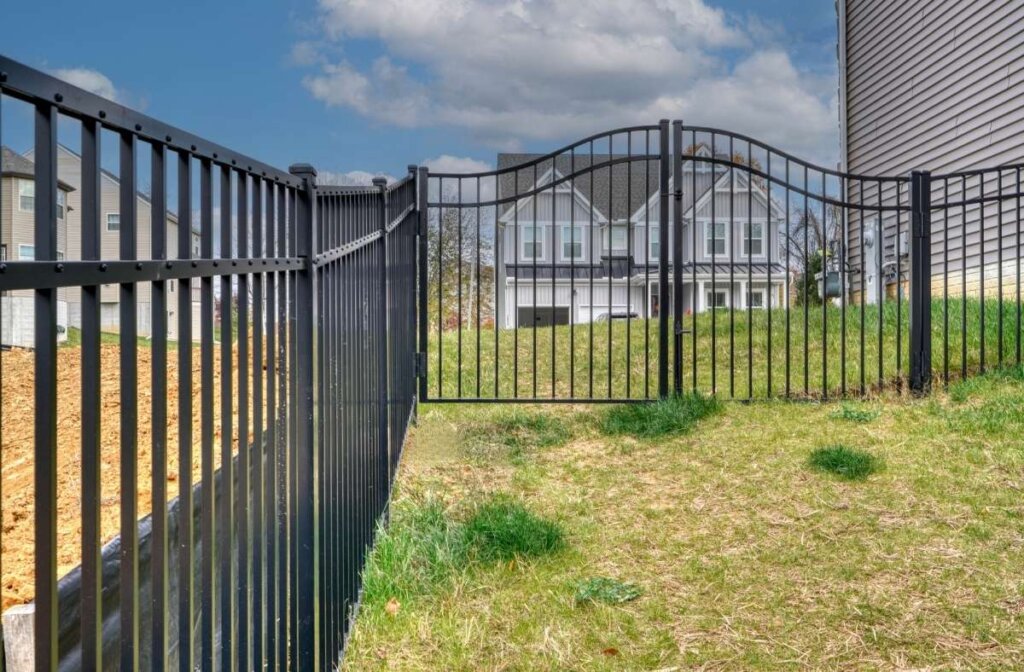 Black gate with double doors