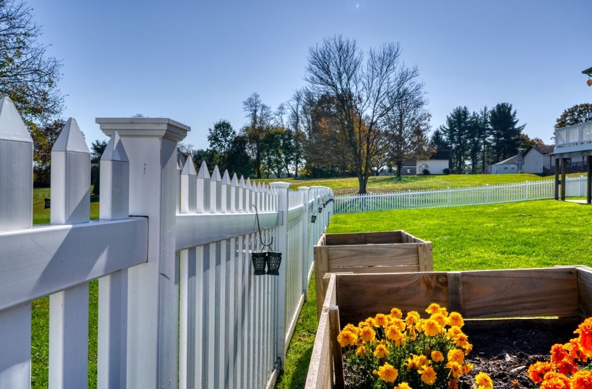 two-toned privacy fence at residential home at Excel Fencing and Decking 