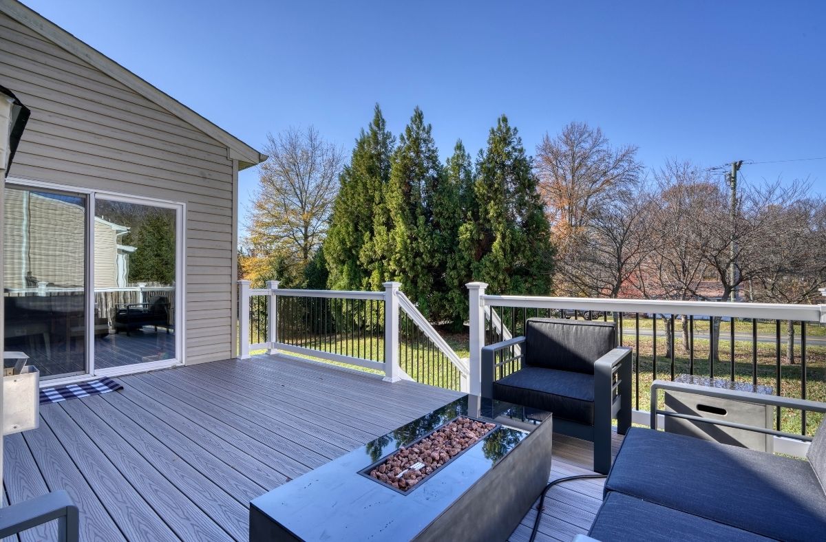low-maintenance deck with a pergola at Excel Fencing and Decking 